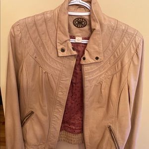 Cream leather jacket.